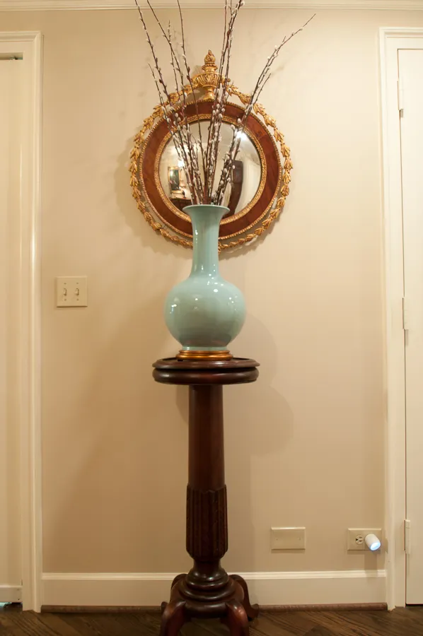 Park Place on Peachtree — Round mirror and celadon vase