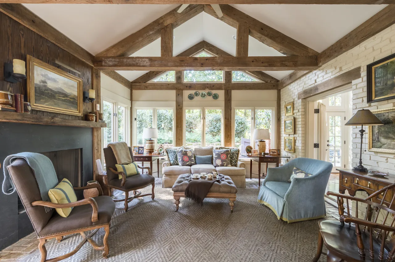 Tuxedo Road — Family room beneath reclaimed beams