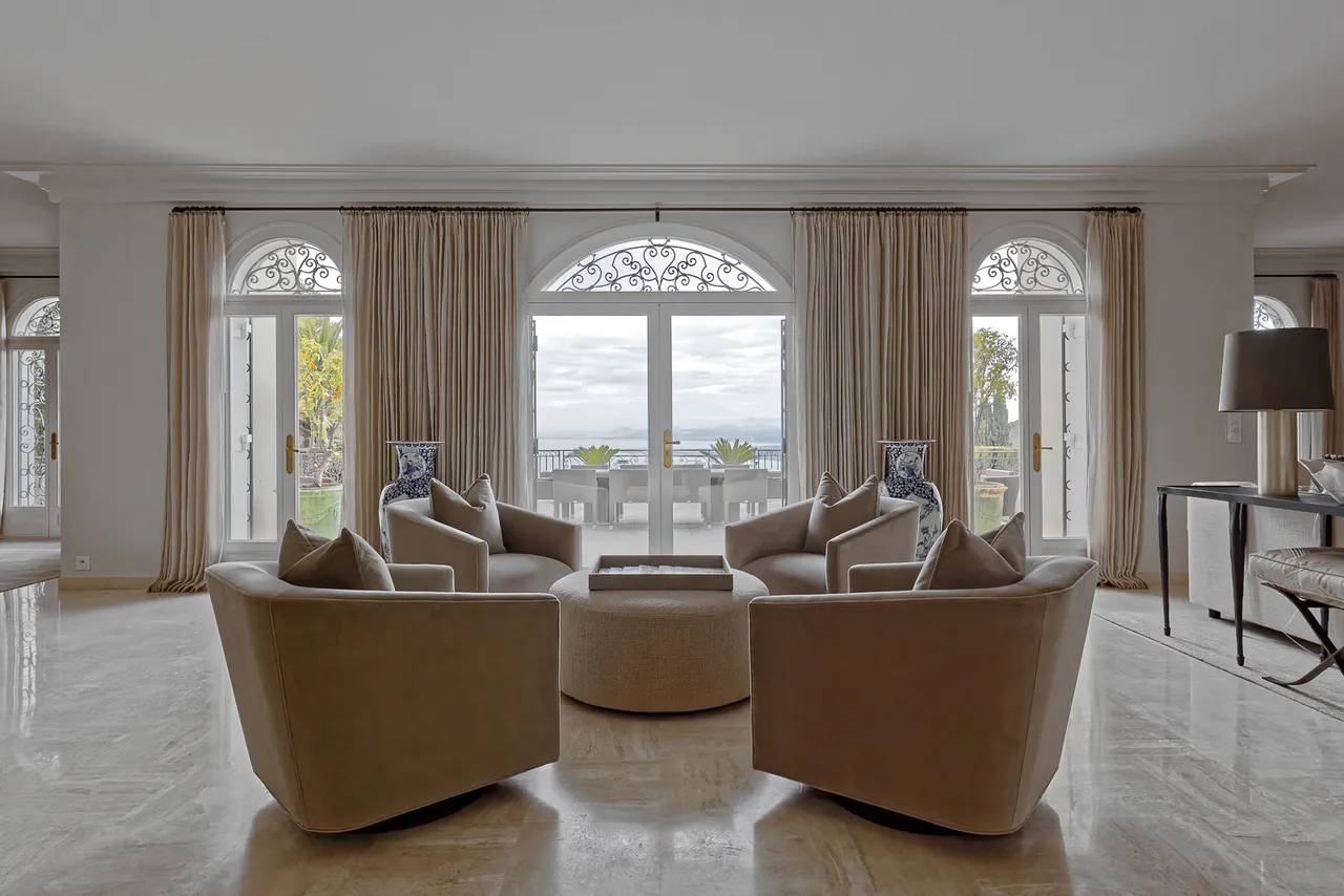 Côte d’Azur — Grand salon with arched windows
