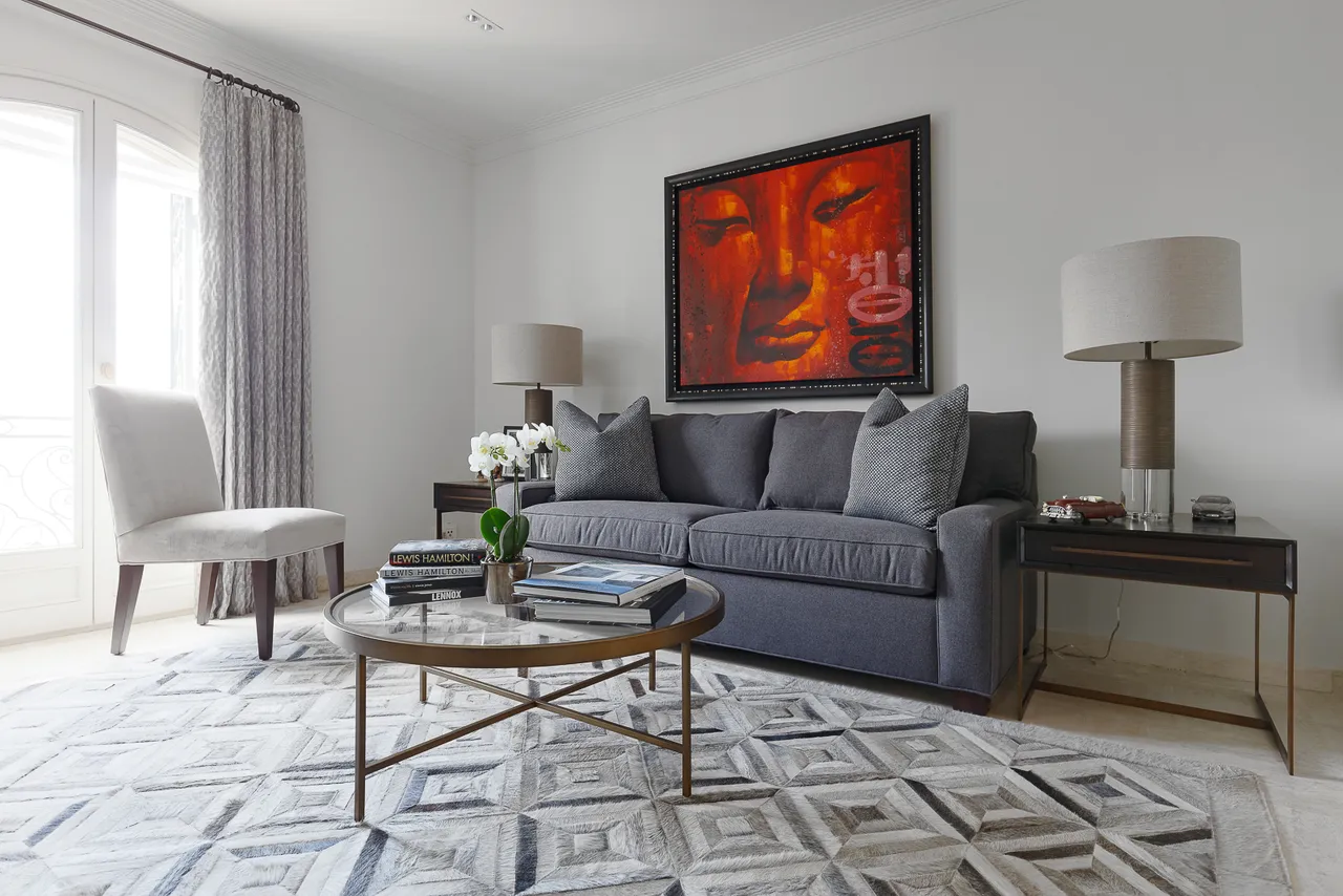 Côte d’Azur — Living room with red abstract artwork